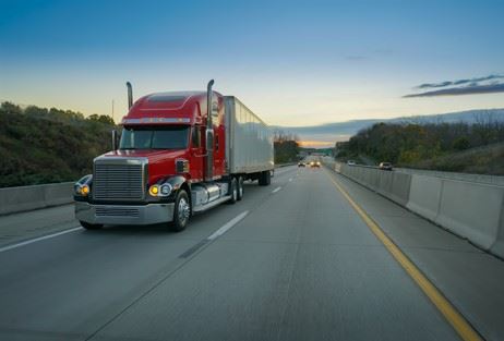 semi truck driving on california freeway